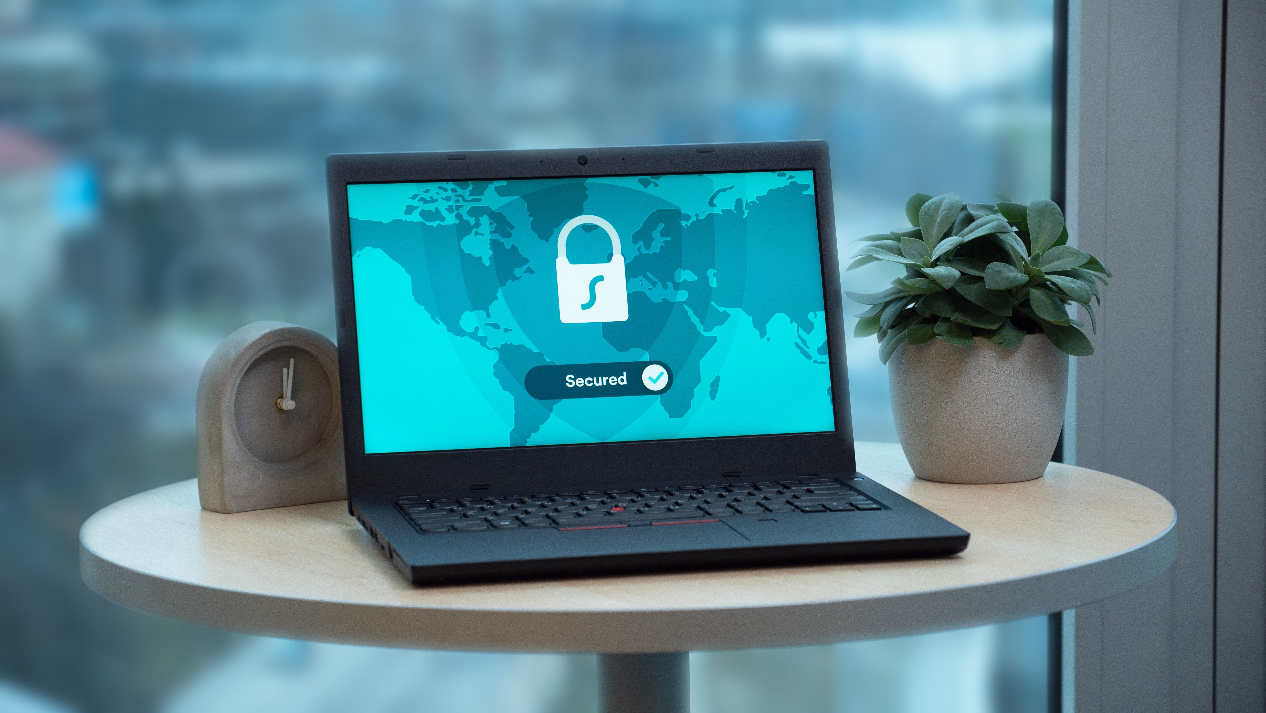 Laptop displaying a security lock icon, representing online safety and privacy.